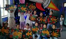 凸眼睛，阔嘴巴，好像一朵大红花(打一动物)