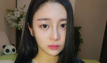 逆境中她始终微笑