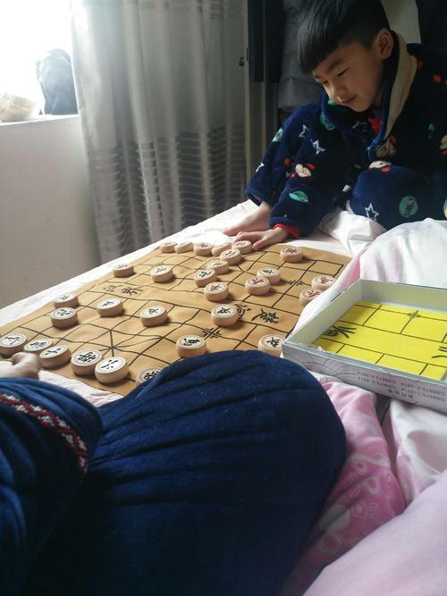 爸爸教我下棋