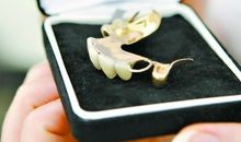 名人故事：一副假牙拯救世界