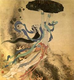 女性蹲石头